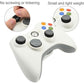 Joystick damping rings set on controller thumbsticks with extra ring pieces