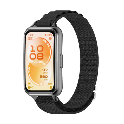 Black woven nylon watch band fitted to a silver smartwatch.