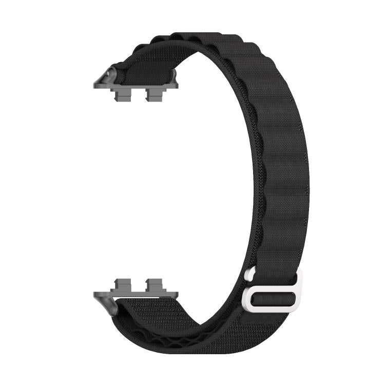 Black woven nylon watch band shown from the underside with its loop clasp and connectors.