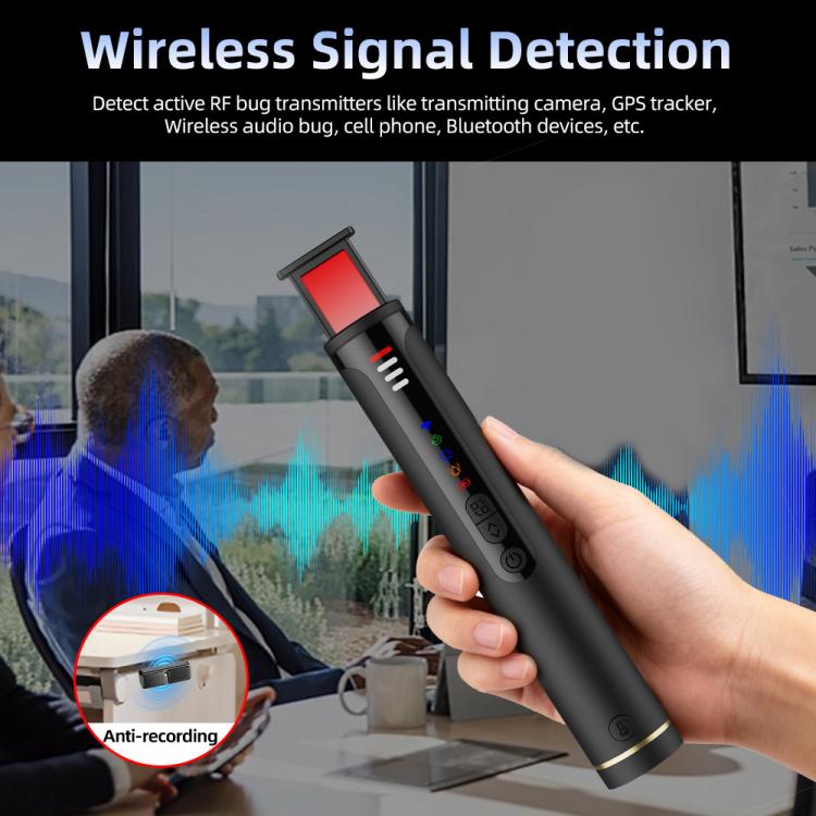 Handheld black infrared detector in a hand with red top panel
