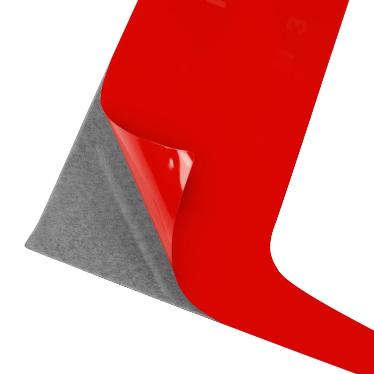 Carbon-fiber sticker with red backing/cover sheet and gray adhesive layer
