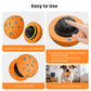 Orange smart pet toy ball with blue paw pattern showing the open shell