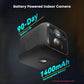 Black battery-powered indoor WiFi camera close-up with front lens and base