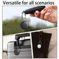 Black round mini GPS Bluetooth location tracker with key ring, held in hand