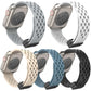 Five perforated silicone watch bands in light gray, white, beige, blue, and black