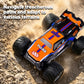 Orange and black amphibious 4WD remote control off-road car kicking up dust