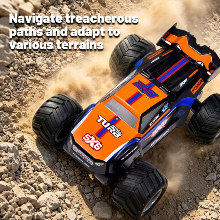 Orange and black amphibious 4WD remote control off-road car kicking up dust