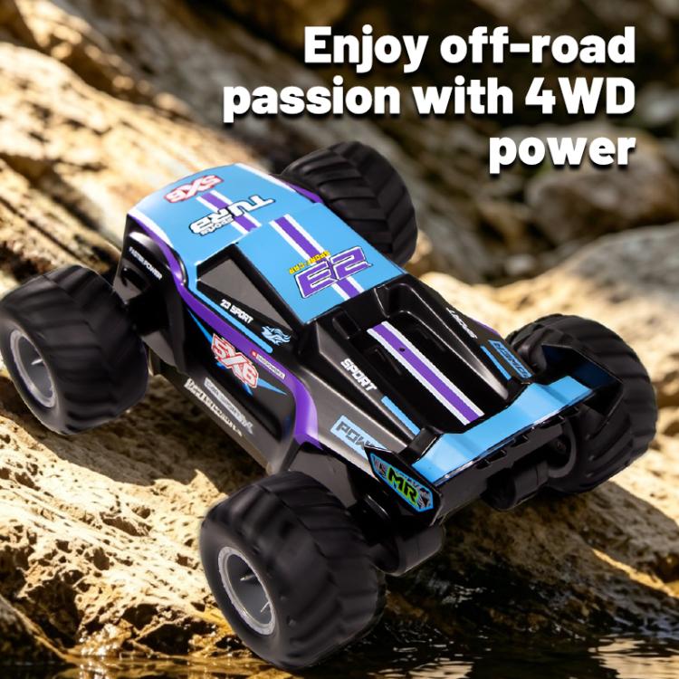 Purple and blue amphibious 4WD remote control off-road car on rocky trail