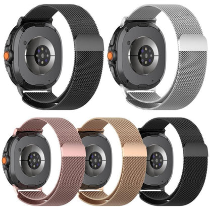 Five Milanese metal watch bands on watches in black, silver, rose gold, and gold