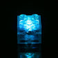 Transparent LED building-block cube glowing ice blue