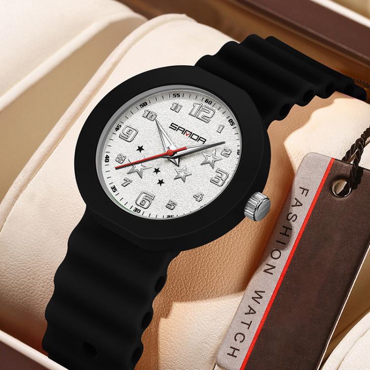 Black silicone student watch with white dial, red second hand, and star details