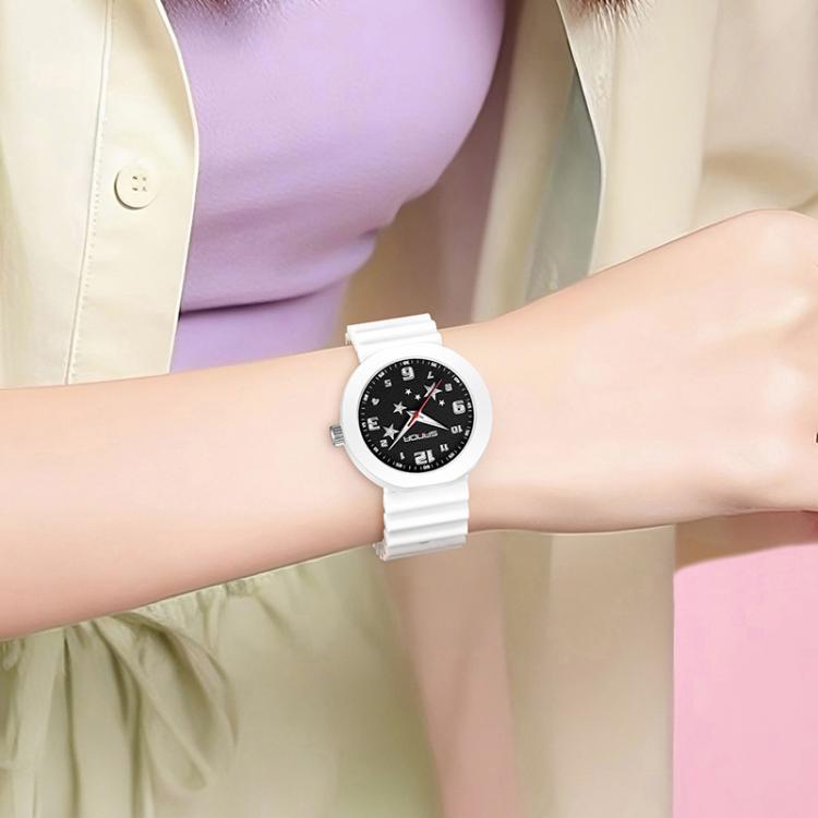 SANDA student wristwatch with white strap and black star dial on a wrist