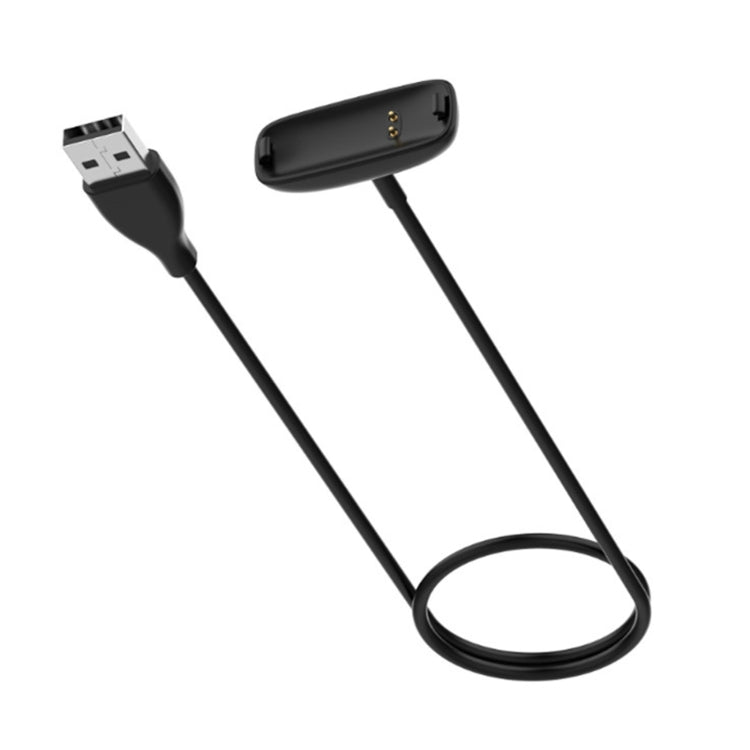 Black USB charging cable with two-prong plug and small rectangular watch charging clip