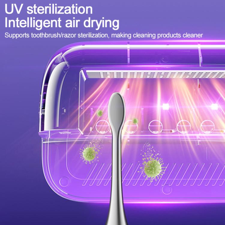 UV sterilization chamber inside the holder with purple light over toothbrush slots