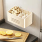White magnetic refrigerator storage rack with large open bin holding garlic bulbs