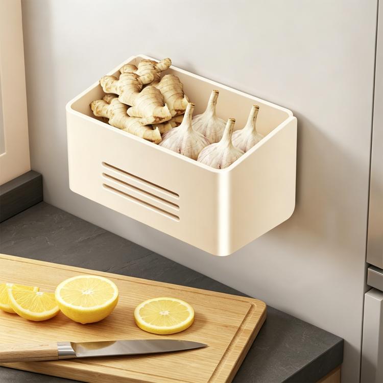 White magnetic refrigerator storage rack with large open bin holding garlic bulbs