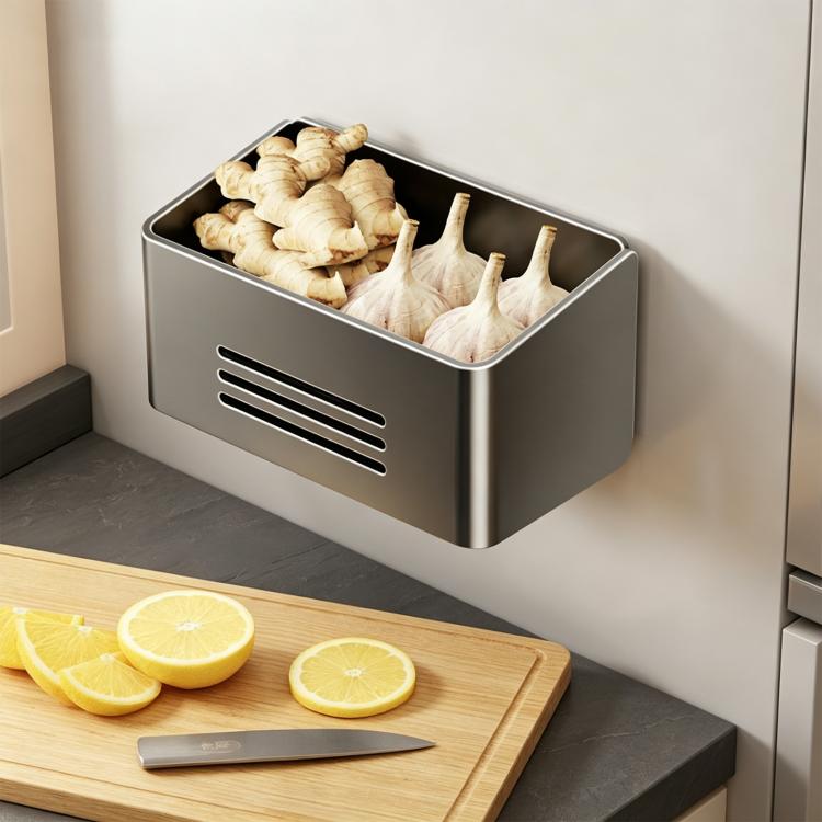 Grey magnetic refrigerator storage rack with large open bin holding garlic