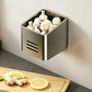 Grey magnetic refrigerator storage rack with open bin holding whole eggs