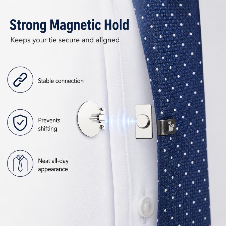 Magnetic tie clip securing a blue dotted tie on a white dress shirt