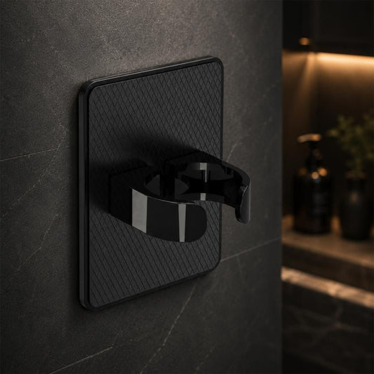 Black wall-mounted comb holder rack with open clamp for storing combs