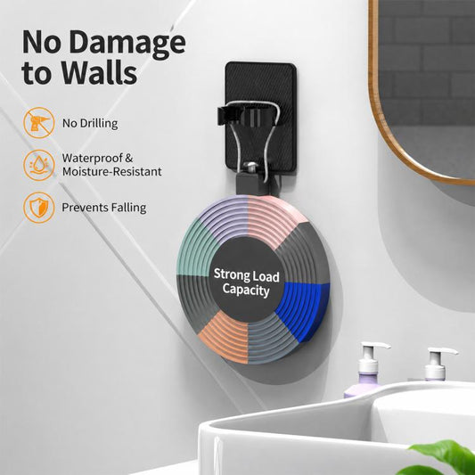 Black wall-mounted comb holder rack holding coiled combs on a wall