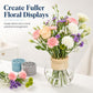Beige plastic stem holder on a clear glass vase with pink and purple bouquet