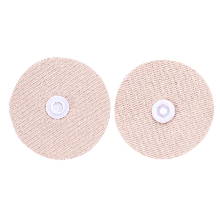 Round fabric snap fasteners, light pink/beige with white snap centers, pair