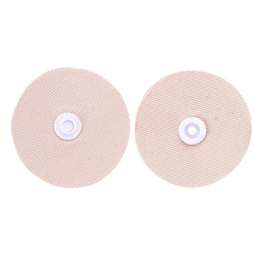 Round fabric snap fasteners, light pink/beige with white snap centers, pair