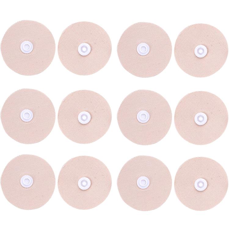 Multiple round fabric snap fasteners, light pink/beige with white snap centers