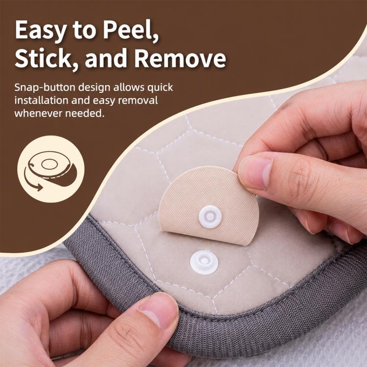 Peel-and-stick snap fasteners on quilt seams, round beige discs with white centers