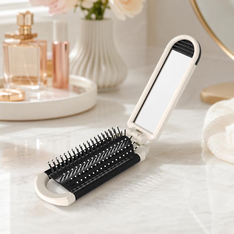 2-in-1 folding hairbrush with mirror, white body and black bristle pad