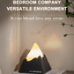 Mini volcano aroma diffuser night light with warm flame glow on dark base