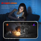 Black mini wireless security camera with lens in infrared night-vision style view