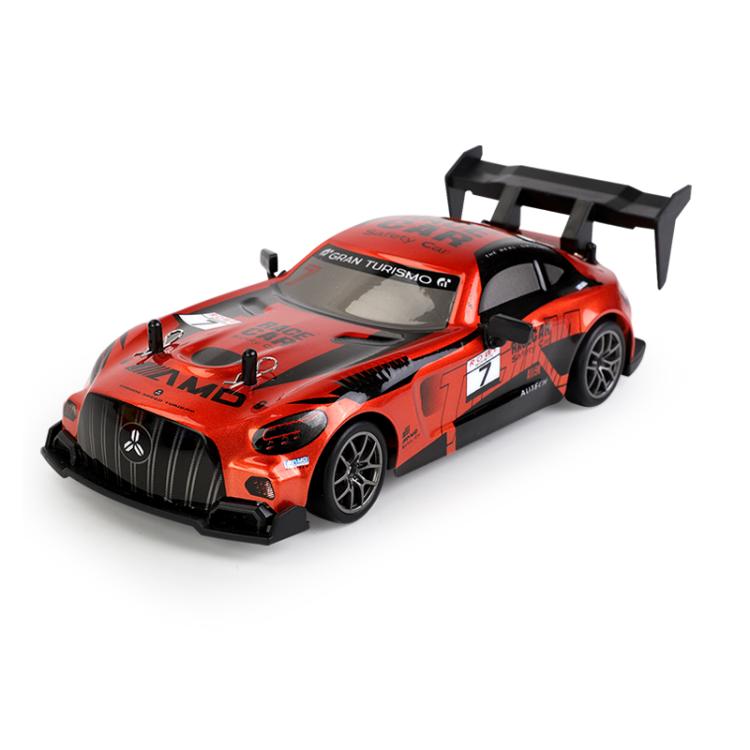 Orange remote control drift car with rear spoiler and black wheels