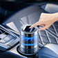 Silver car aroma diffuser being set on the dashboard area, blue-lit turbine top