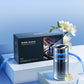 Silver car aroma diffuser beside product box, blue glow and clear chamber visible