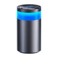Cylindrical car air freshener diffuser with black top, blue glow band, and silver body