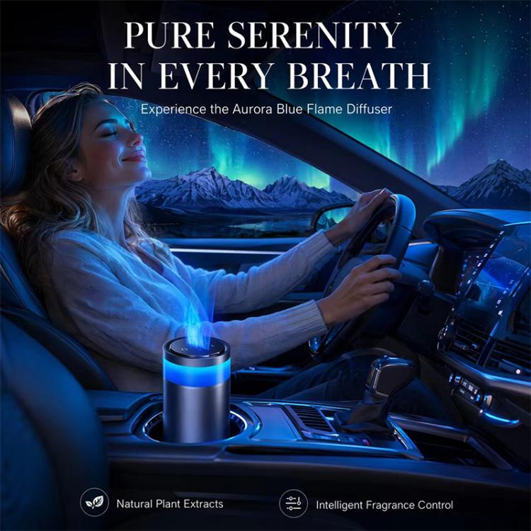 Car fragrance diffuser cylinder emitting a blue mist plume