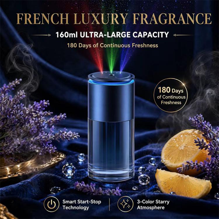 Car aroma diffuser with blue-lit top and visible mist vapor