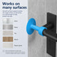 Blue suction cup door handle protector pad on a black latch plate