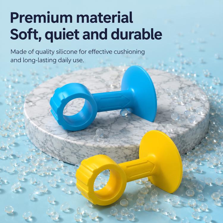 Blue and yellow suction cup door handle protector pads on a light base