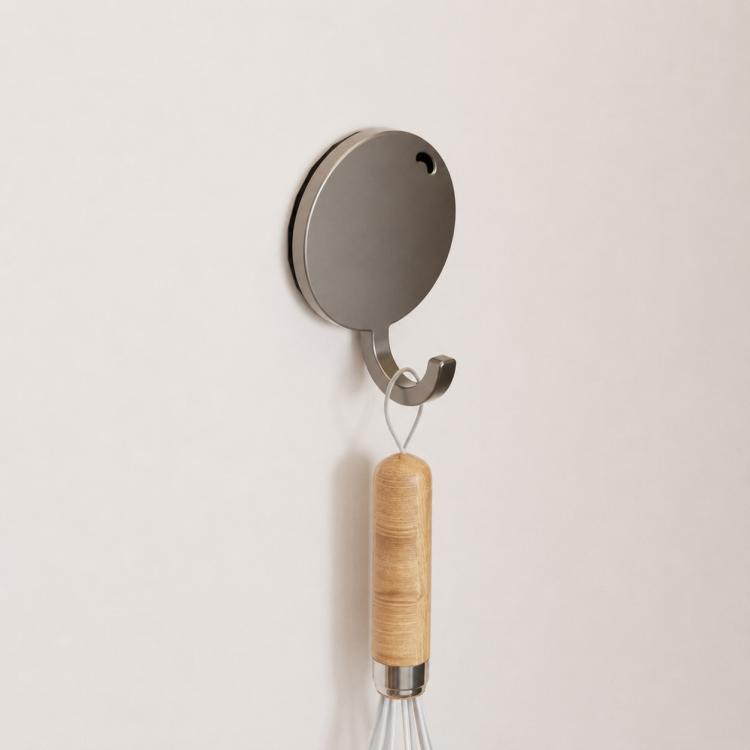 Round magnetic metal wall hook with small curved hanger and wooden handle accessory