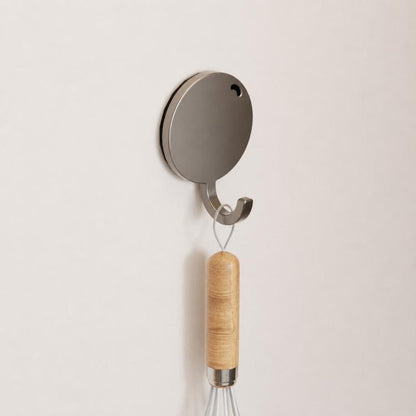 Round magnetic metal wall hook with small curved hanger and wooden handle accessory