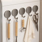 Set of round magnetic metal wall hooks with curved hangers and wooden grips