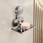 Grey wall-mount suction cup soap and sponge holder with drainable metal tray