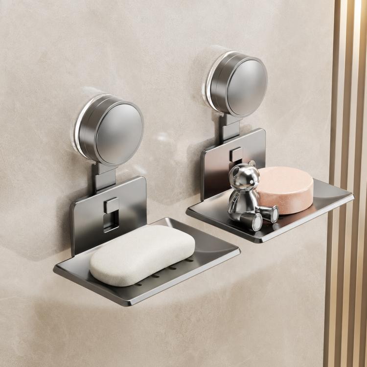 Two grey suction cup soap and sponge holders with drainable metal trays
