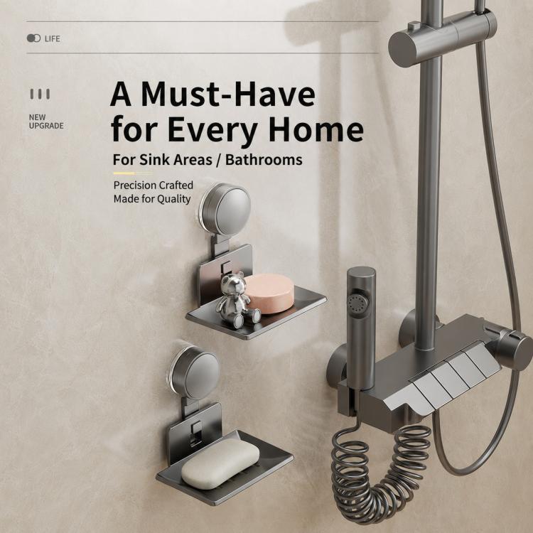 Two wall-mounted suction cup soap holders with silver-gray metal drain trays