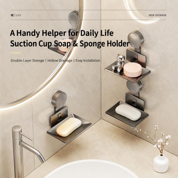 Multiple suction cup soap and sponge holders with drainable metal trays on wall