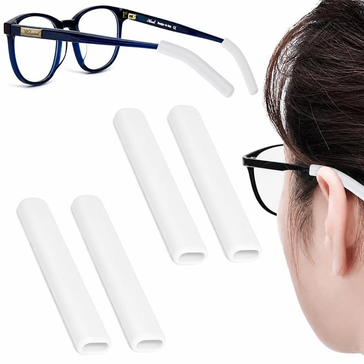 Soft silicone eyeglass ear pads, white pair shown with eyeglass temple and wearer.