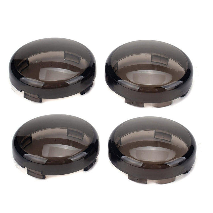 Set of four black motorcycle turn signal covers with smoked clear lenses